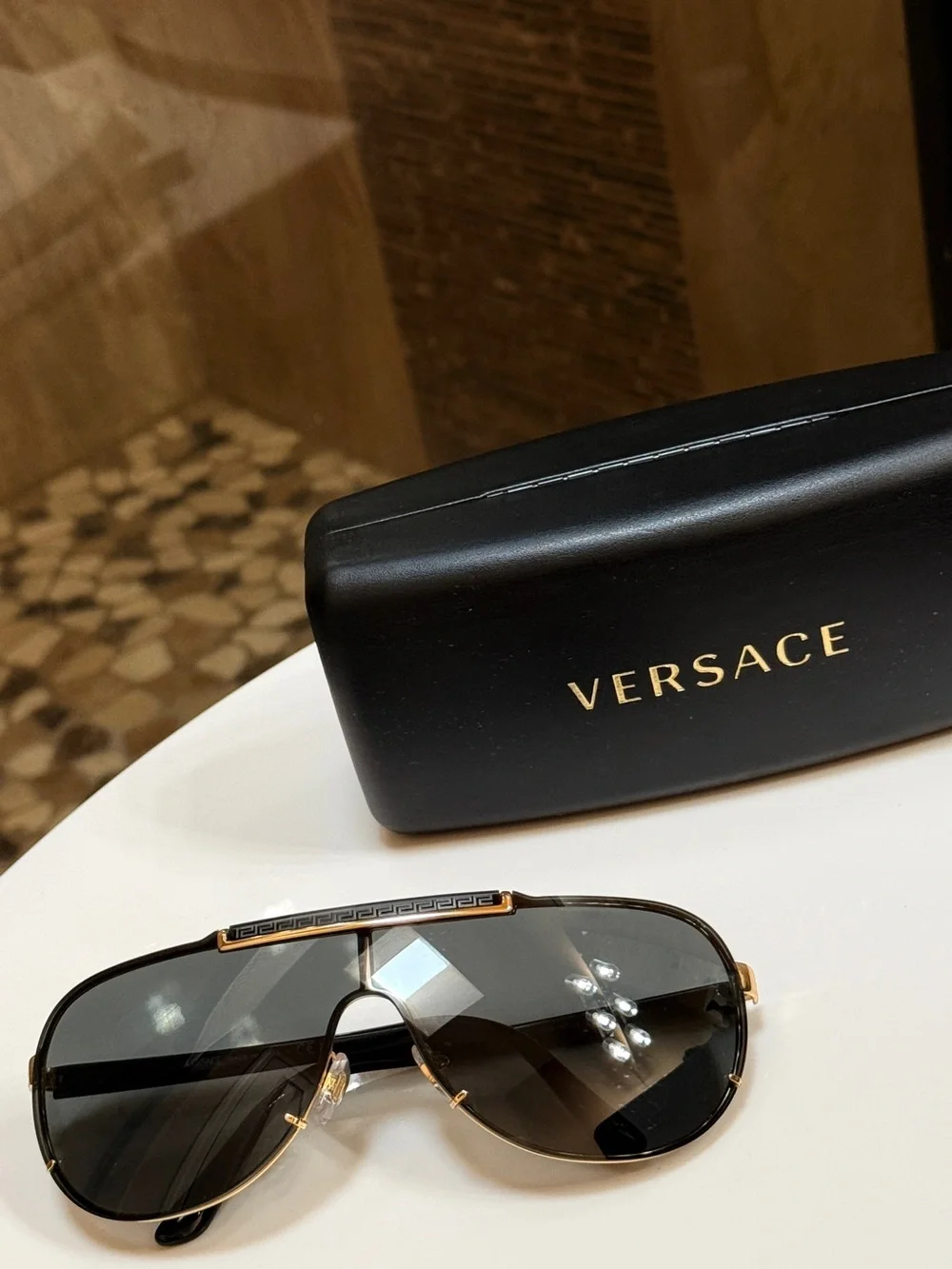 Versace MENS WOMENS Unisex Gold and Black Shield Sunglasses VE2140